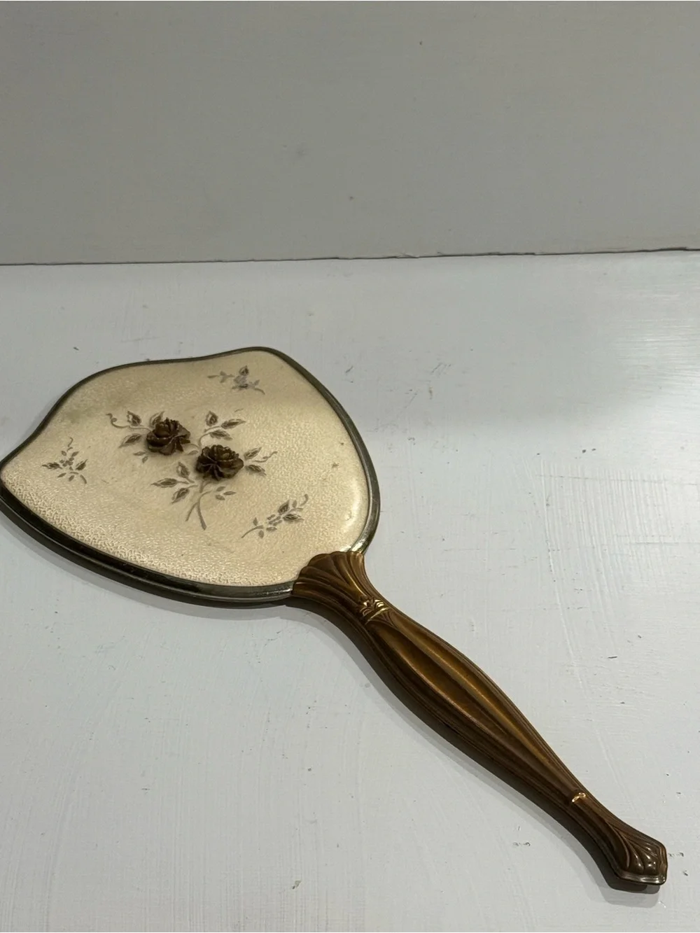 Mid Century Hollywood Regency Hand Held Mirror with Floral Detail 1950’s